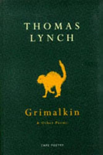 Dark green book cover with a golden cat silhouette and title.