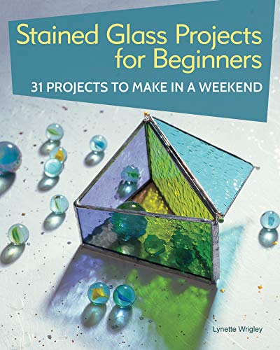 Book cover featuring a geometric stained glass pyramid and colorful glass pieces.