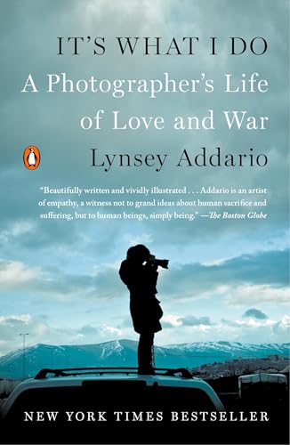 Book cover: photographer silhouetted against mountains, titled “It’s What I Do.”