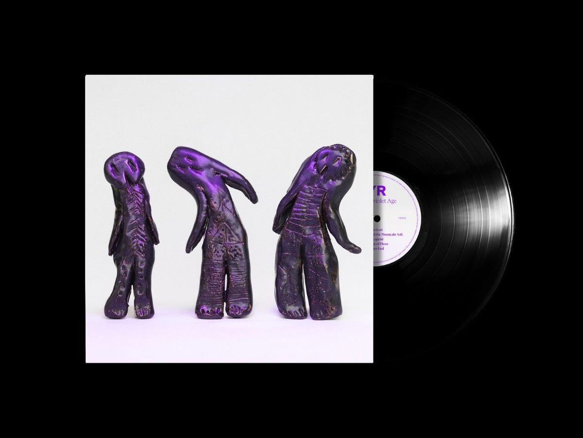 LYR album cover with three purple statues and a vinyl record.