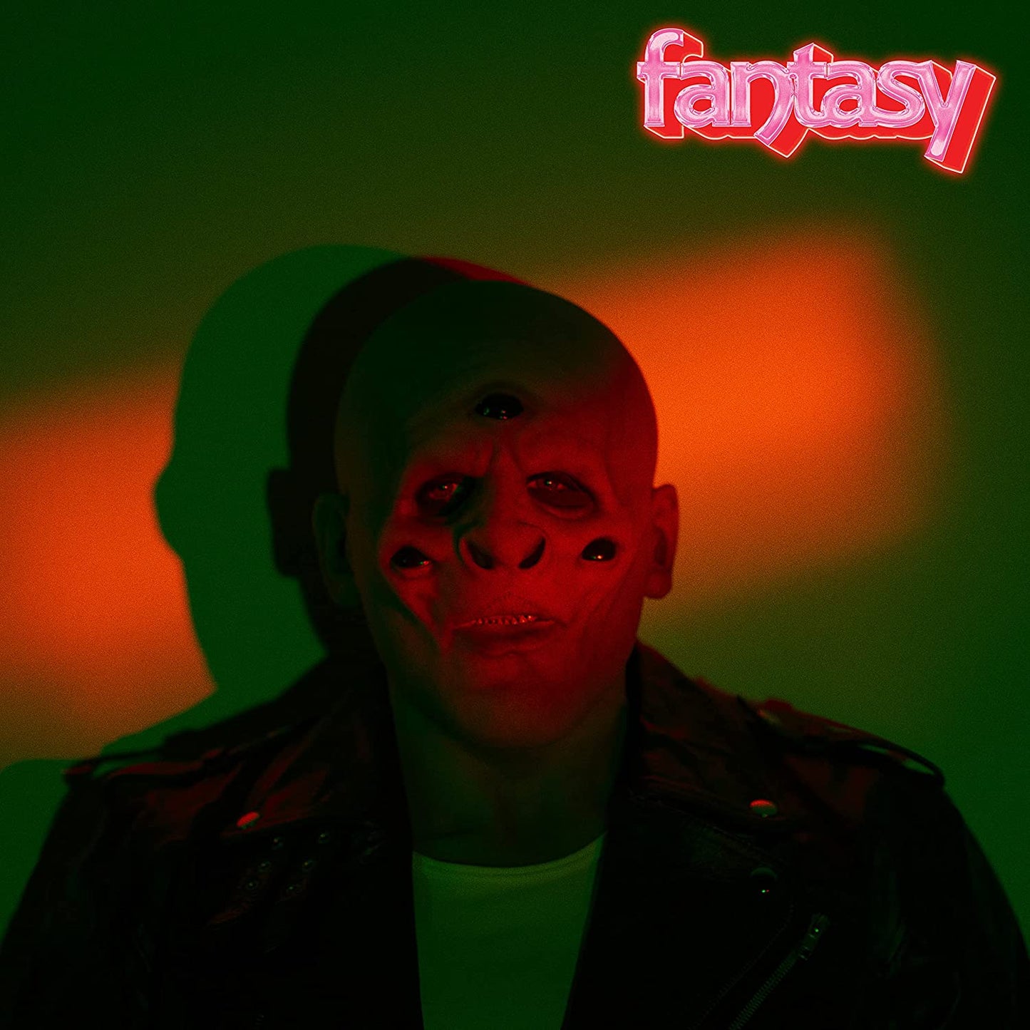 M83 "Fantasy" CD cover: red and green portrait of a man’s face.
