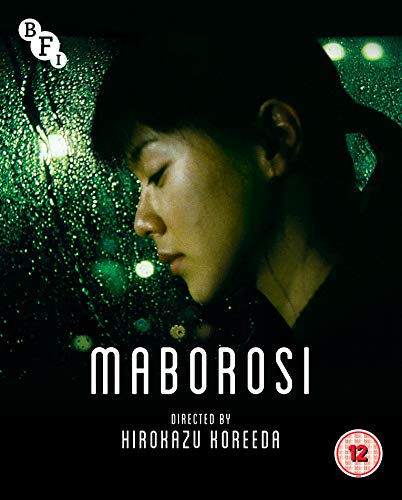 Maborosi Blu-ray cover featuring a woman’s face seen through rain-streaked glass.