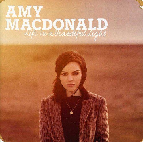 Amy Macdonald album cover featuring a portrait of the singer.