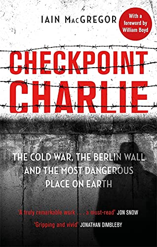 Book cover for "Checkpoint Charlie" depicting barbed wire and a shadowy figure.