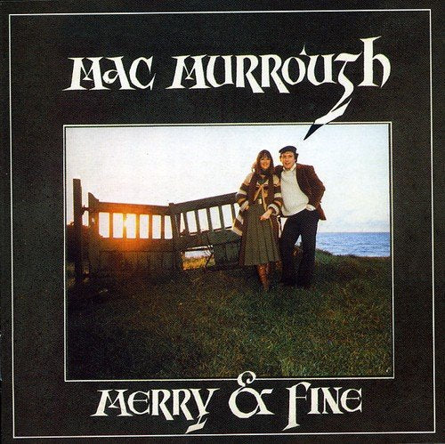 "Album cover with couple standing near a wooden fence at sunset, on black background."