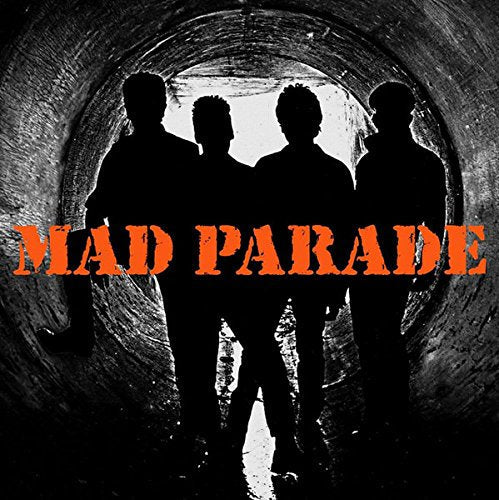 Silhouetted band in a tunnel with large, distressed red "MAD PARADE" text.