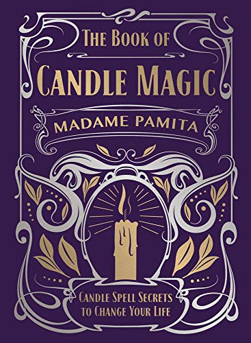 Book with colorful candles and mystical symbols on the cover, likely in a softcover format.