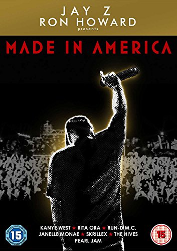 DVD cover showing a silhouette of a performer holding a microphone before a crowd.