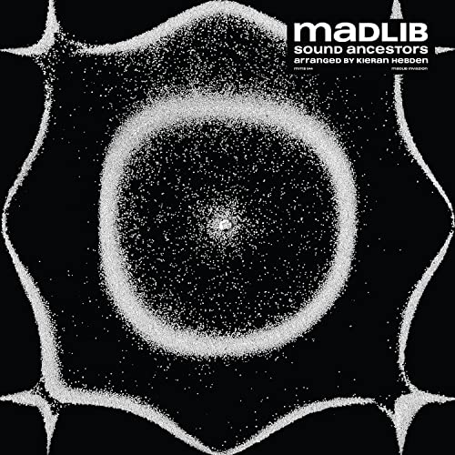 Black album cover with a grainy, circular, star-like white design.