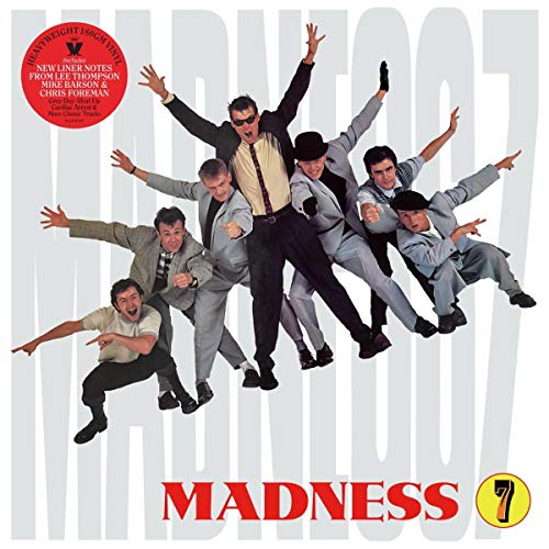 Album cover for Madness’ “7” featuring the band in suits striking poses.