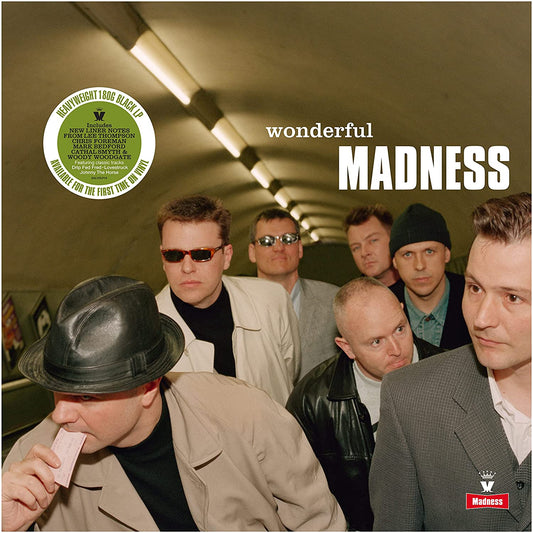Madness album cover, “Wonderful”, featuring a group of men in a tunnel.