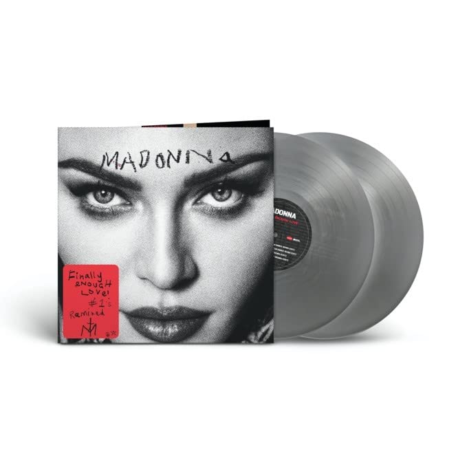 Madonna album cover and two grey vinyl records against white background.