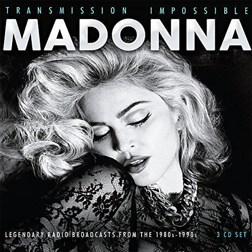 Black and white CD cover featuring Madonna with eyes closed, lace detail.