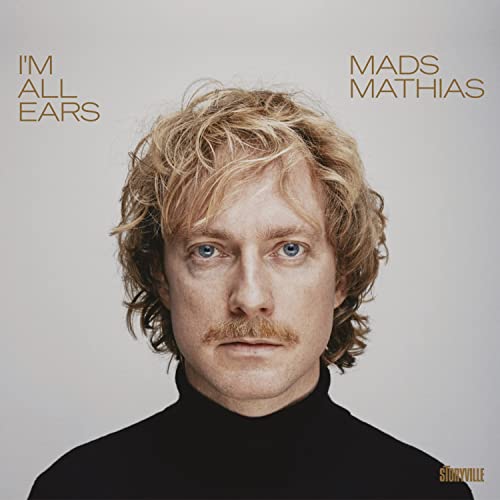 CD cover featuring a portrait of Mads Mathias with curly hair.
