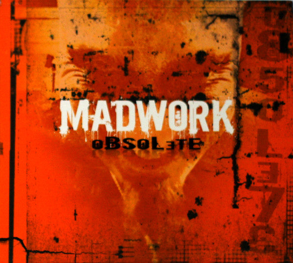 CD cover for “Madwork - Obsolete” with a blurred, red-toned face.