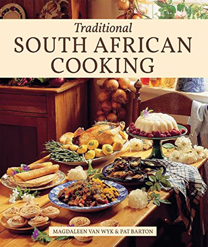 Cookbook cover featuring a table laden with South African food.