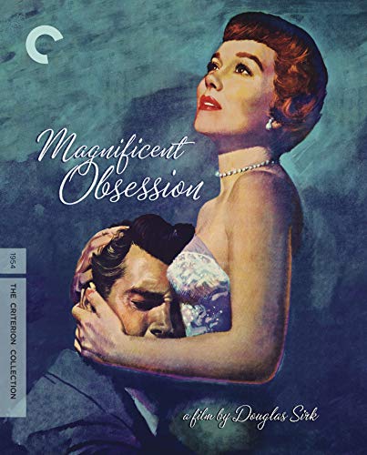 1954 film poster: woman looking up, man embracing her waist.