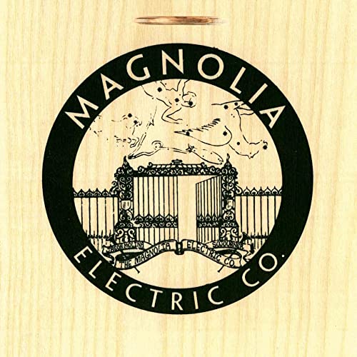 Black and white circular logo for Magnolia Electric Co. with ornate imagery.