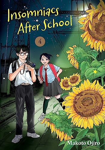 Manga cover featuring a boy with a camera and girl standing near sunflowers.