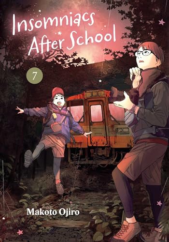 Manga cover featuring two characters near an old train car at night.