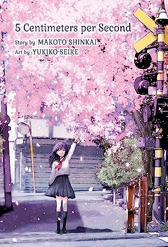 Girl reaching up under falling pink blossoms near a railway crossing.