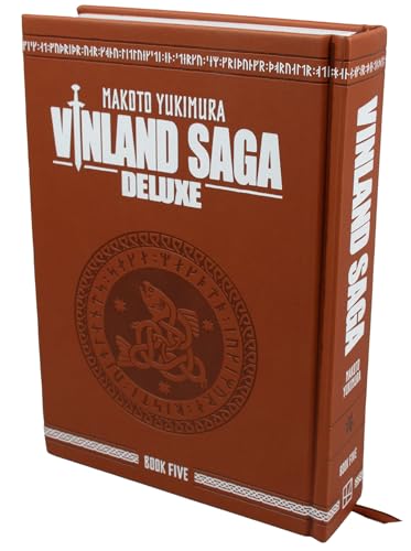Brown hardcover book titled Vinland Saga Deluxe Book Five with Norse-inspired circular emblem.