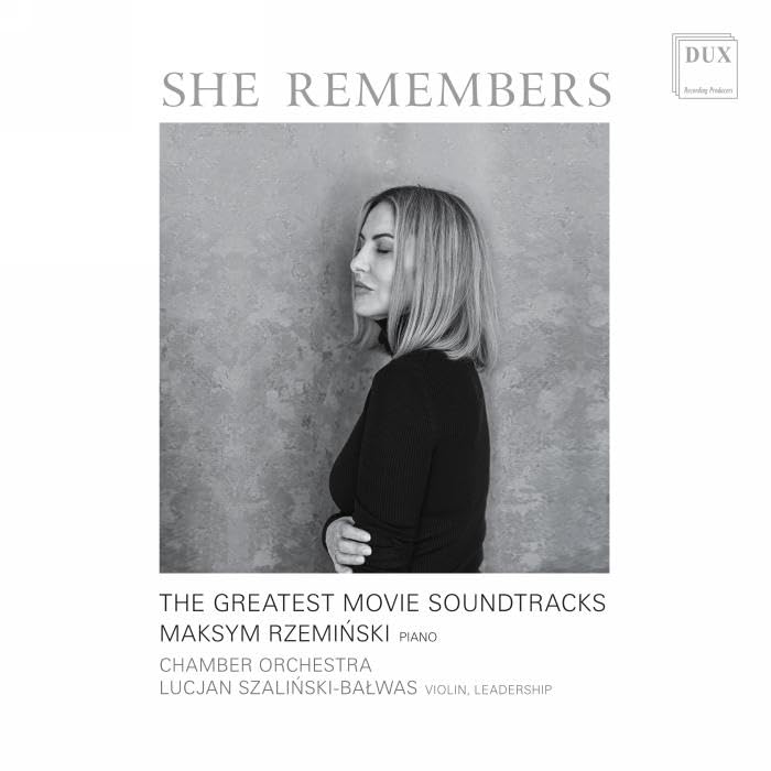 CD cover: woman’s portrait, text “She Remembers”, and artist names.