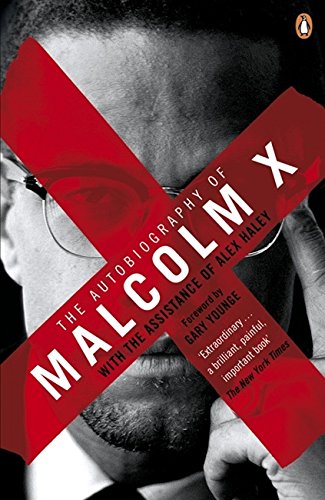 "Book cover of 'The Autobiography of Malcolm X' with a black and white photo."