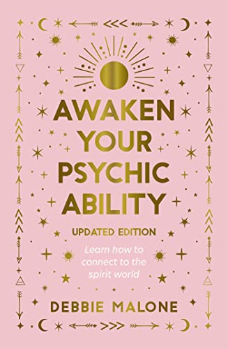 Book cover with gold text and celestial symbols on a light pink background.