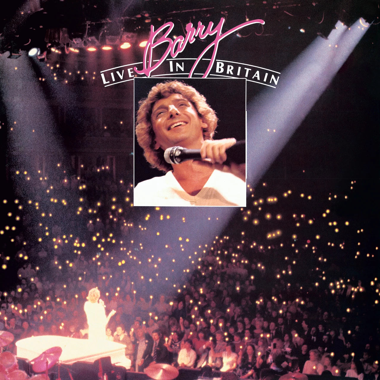 CD case with Barry Manilow's name and live performance photo in Britain setting.