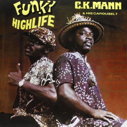 Vinyl album cover featuring two men in patterned shirts and hats.