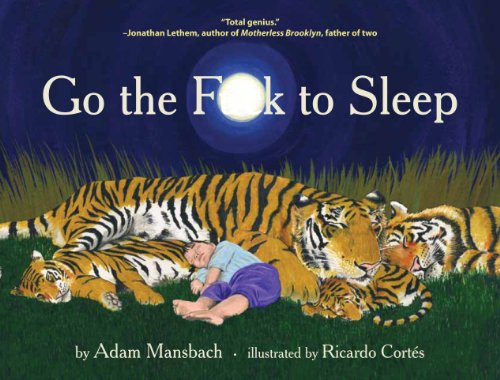 A child sleeps soundly in the grass surrounded by a family of tigers.