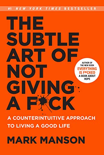 Orange book cover with bold white text: "The Subtle Art of Not Giving a F*ck.