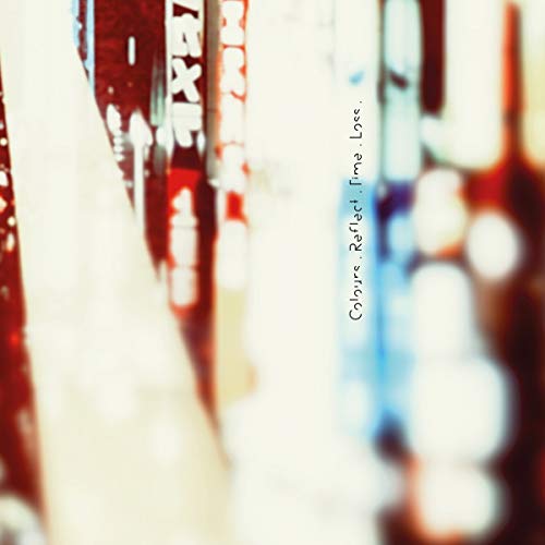 Abstract blurred image of city lights with text reading Colours. Reflect. Time. Loss.