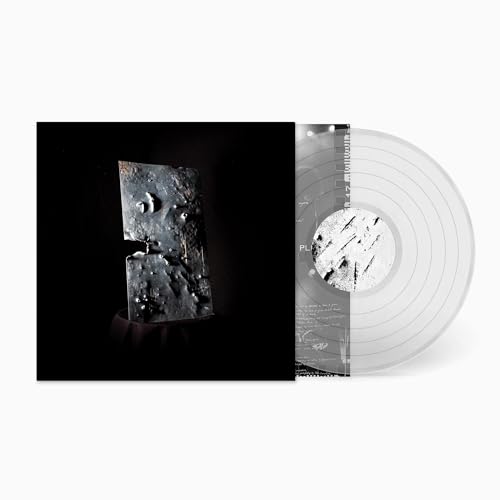 Clear vinyl record with album cover featuring abstract metallic sculpture.