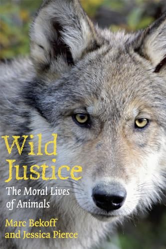 Book cover featuring a close-up of a gray wolf’s face and title text.