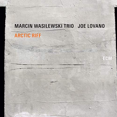 CD album cover with grey textured background and text "Marcin Wasilewski Trio - Arctic Riff".