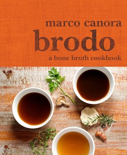 Cover of the Brodo cookbook featuring three bowls of broth and fresh herbs.