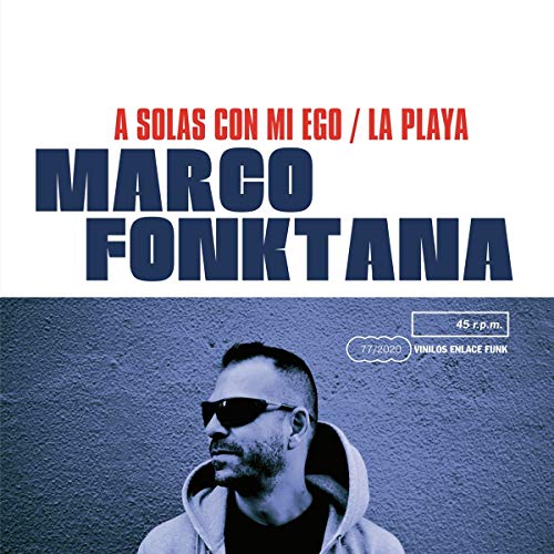 Vinyl record cover featuring a man in sunglasses against a textured wall background.