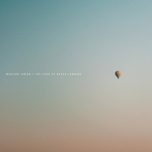 Album cover with a small hot air balloon in a pale sky.
