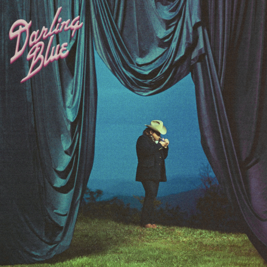Album cover for Marcus King’s “Darling Blue” featuring a man in a hat.