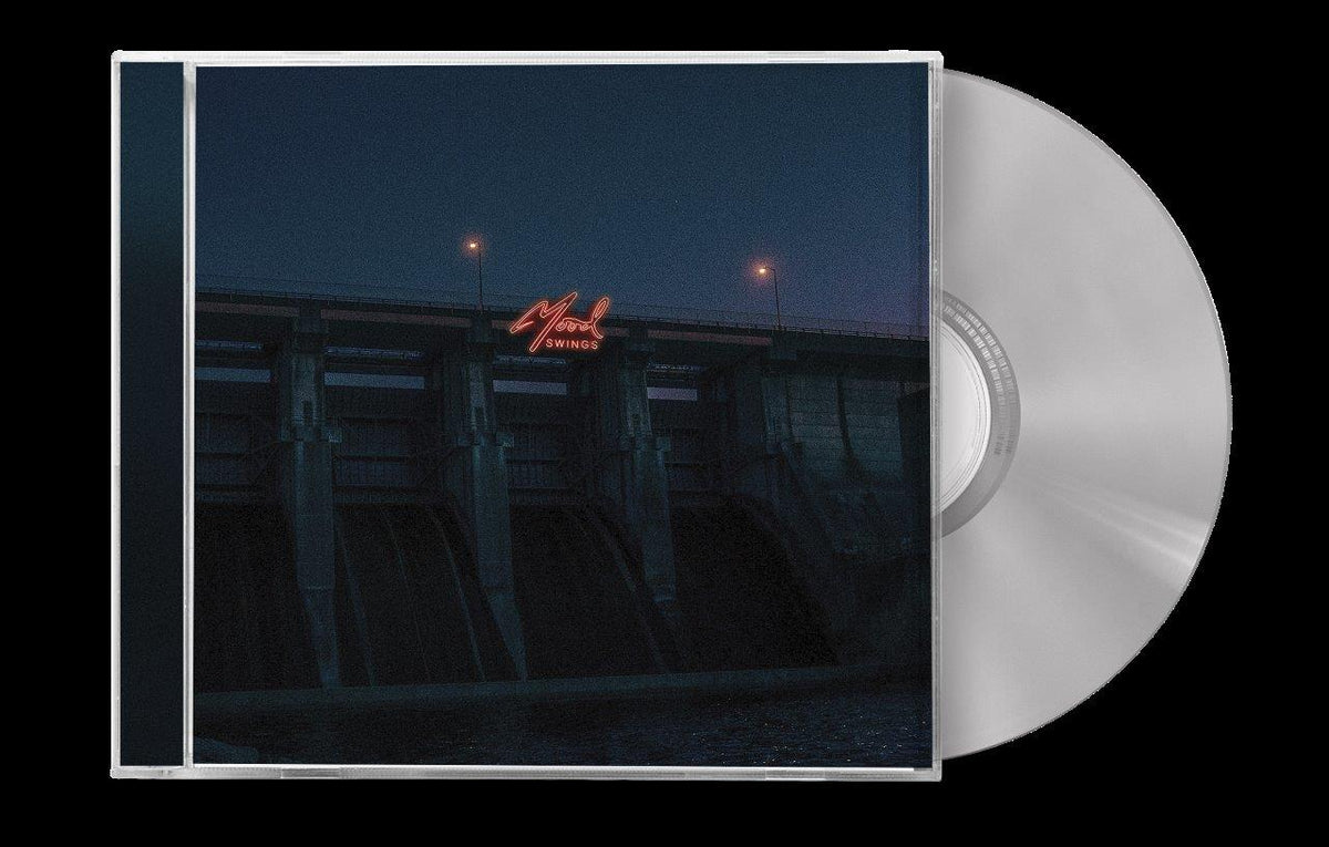 CD case for Marcus King’s “Mood Swings” with a bridge at dusk.
