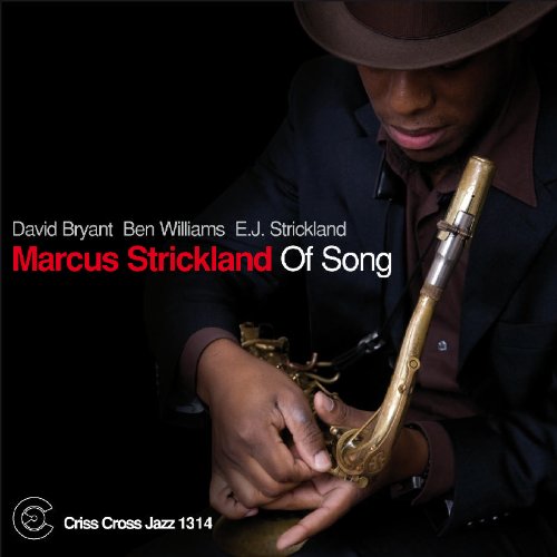 "Album cover featuring a man holding a saxophone, wearing a hat."