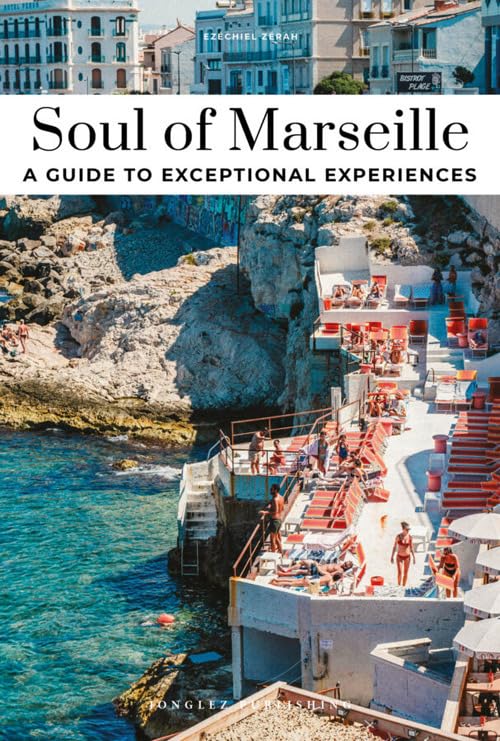 Travel guide cover featuring a coastal scene with sunbathers.