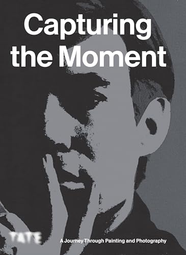 Book cover: grayscale portrait with title “Capturing the Moment.”