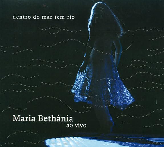 CD cover: Maria Bethânia in blue dress, wavy blue background.