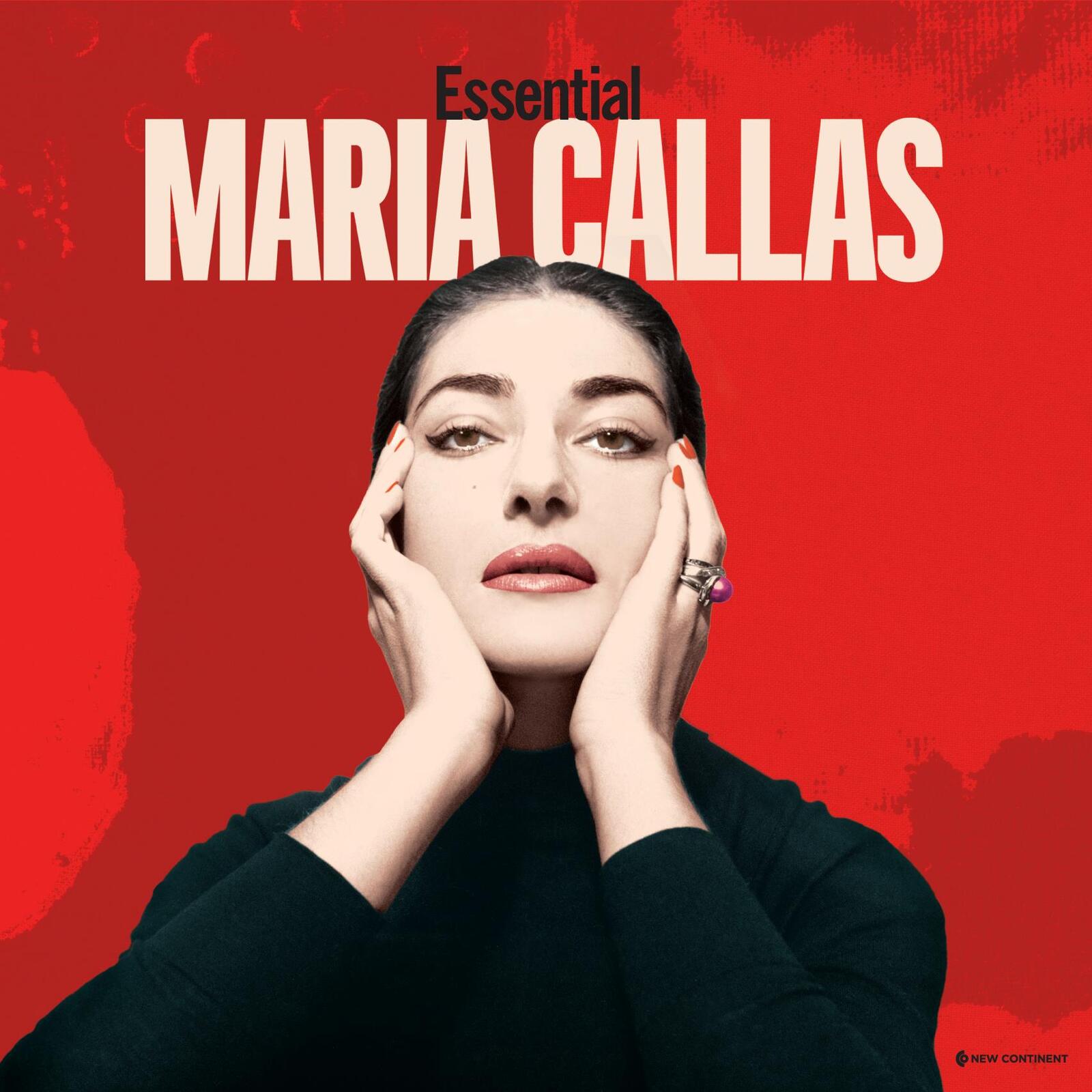 Portrait of Maria Callas with hands on her face against a bright red background.