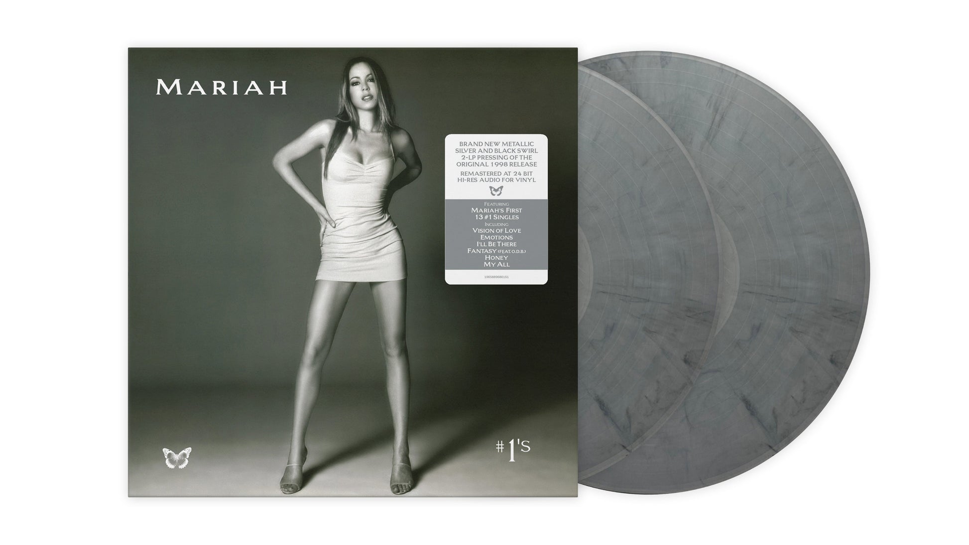 Mariah Carey #1s vinyl album cover with two metallic silver and black swirl records.