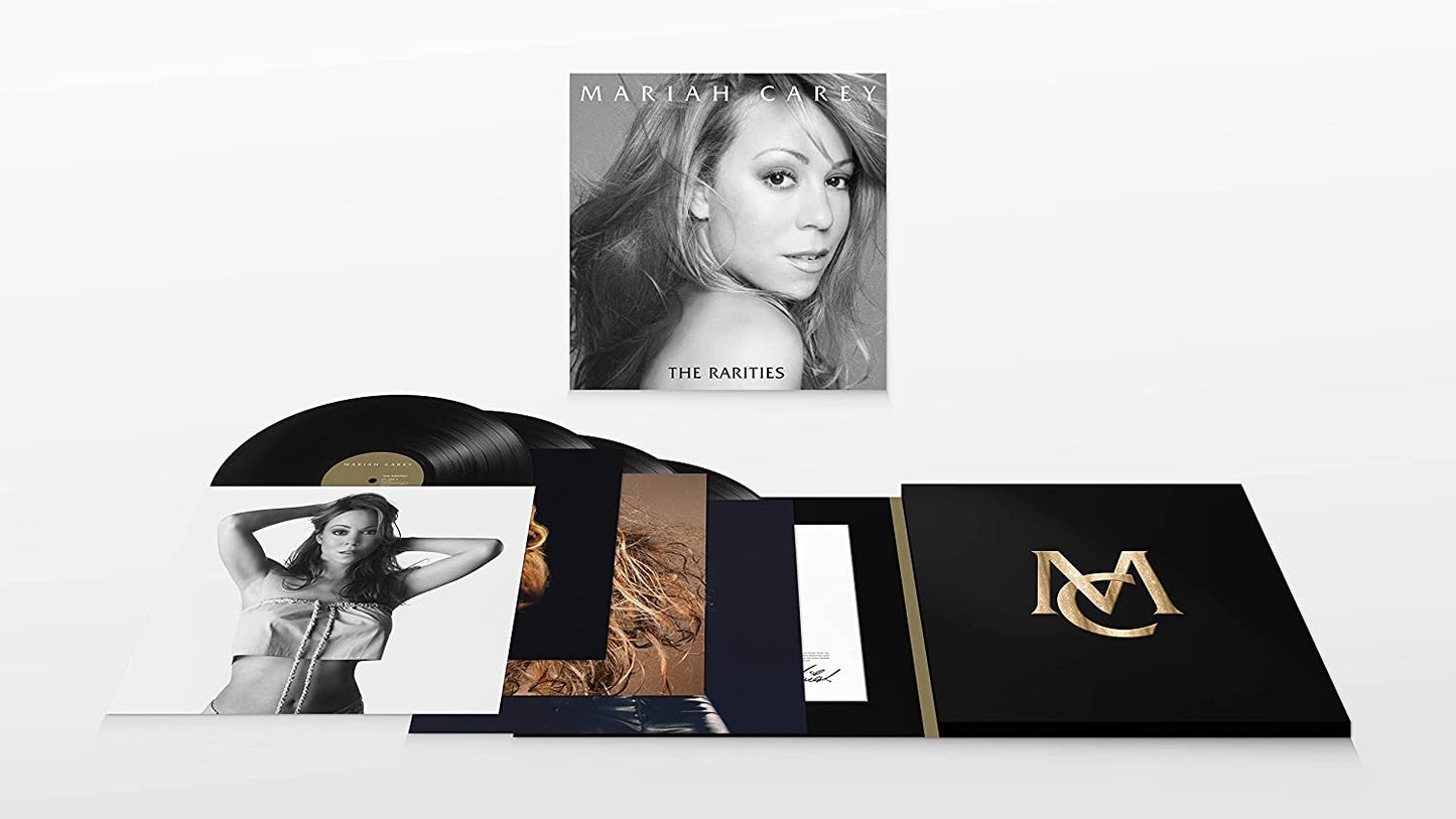 "Mariah Carey's 'The Rarities' vinyl box set with multiple records and artwork."