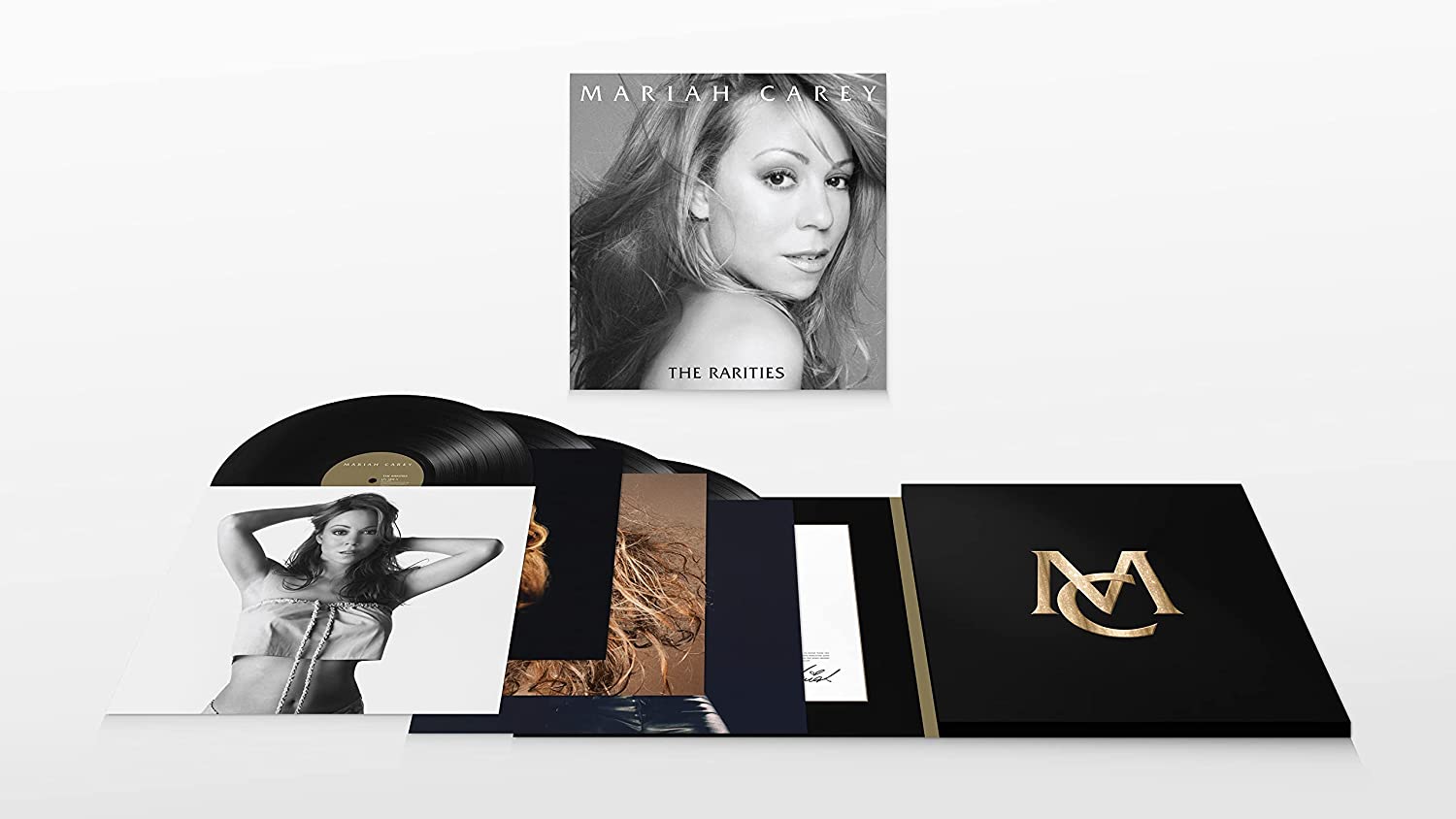 "Mariah Carey's 'The Rarities' vinyl box set with multiple records and artwork."